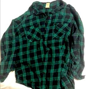 Plaid green long sleeved shirt.